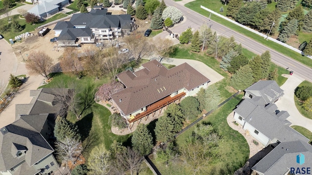 aerial view of property's location featuring nearby suburban area