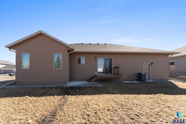 500 E Cairos Pl, Brandon, SD 57005 - rear view of house featuring central AC and fence