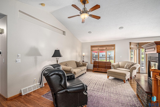 711 Britz Dr, Luverne, MN 56156 - living area featuring ceiling fan, wood finished floors, lofted ceiling, and baseboards