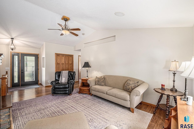 711 Britz Dr, Luverne, MN 56156 - living area with lofted ceiling, a ceiling fan, wood finished floors, and baseboards