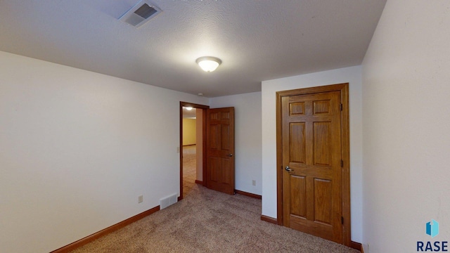 851 Regency Ct, Brookings, SD 57006 - unfurnished bedroom with carpet flooring and baseboards