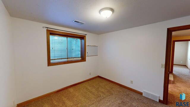 851 Regency Ct, Brookings, SD 57006 - unfurnished room featuring carpet floors and baseboards