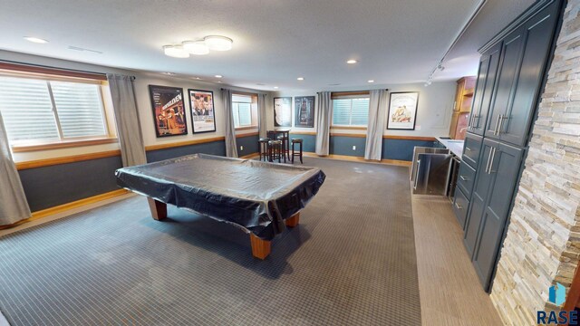 851 Regency Ct, Brookings, SD 57006 - rec room featuring light carpet, billiards, baseboards, and recessed lighting
