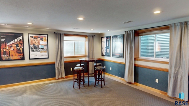 851 Regency Ct, Brookings, SD 57006 - dining area featuring baseboards, recessed lighting, and carpet