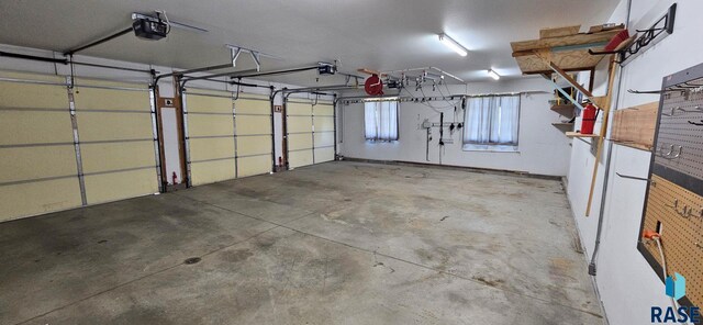 851 Regency Ct, Brookings, SD 57006 - garage featuring a garage door opener