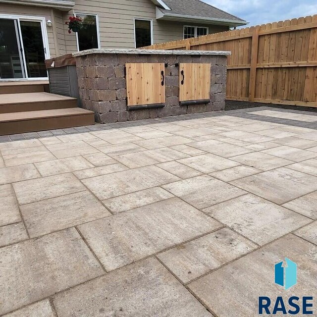 851 Regency Ct, Brookings, SD 57006 - view of patio / terrace with fence