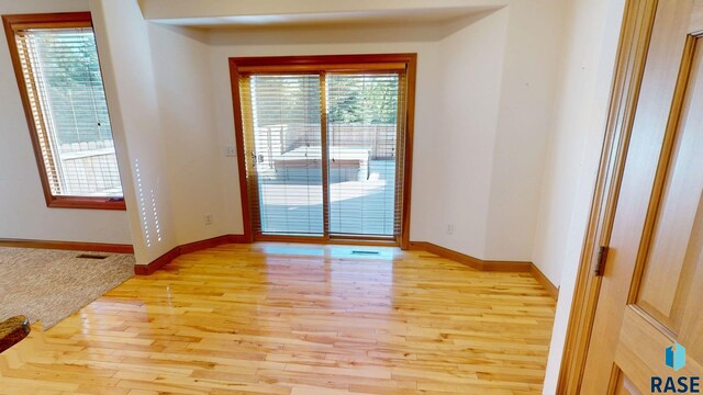 851 Regency Ct, Brookings, SD 57006 - unfurnished room featuring light wood finished floors and baseboards