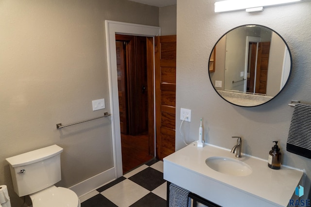 26007 482nd Ave, Corson, SD 57005 - bathroom featuring tile patterned floors, a sink, and toilet