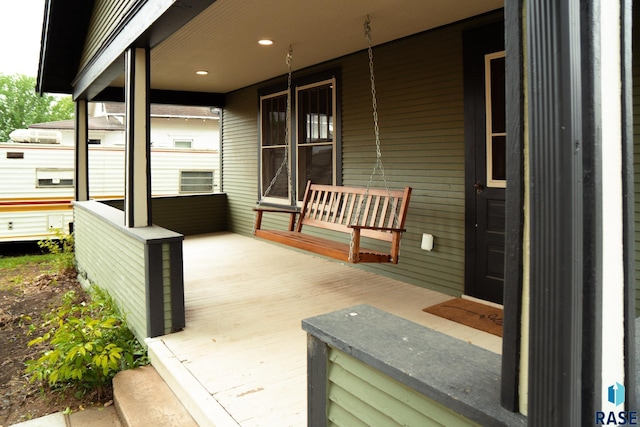 26007 482nd Ave, Corson, SD 57005 - wooden deck with a porch