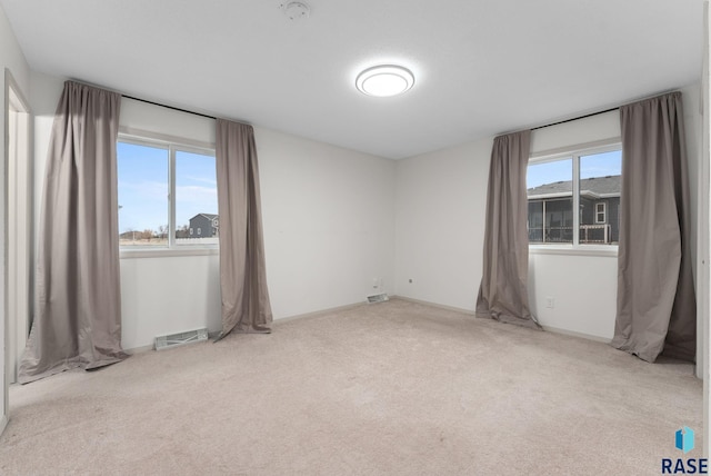 1335 Blue Ox St, Harrisburg, SD 57032 - unfurnished room with carpet and a smoke detector