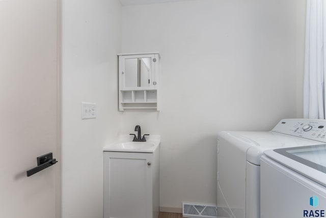 1335 Blue Ox St, Harrisburg, SD 57032 - laundry room featuring washer and dryer