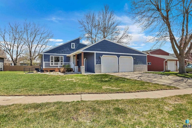 view of front of home with an attached garage, concrete driveway, and covered porch