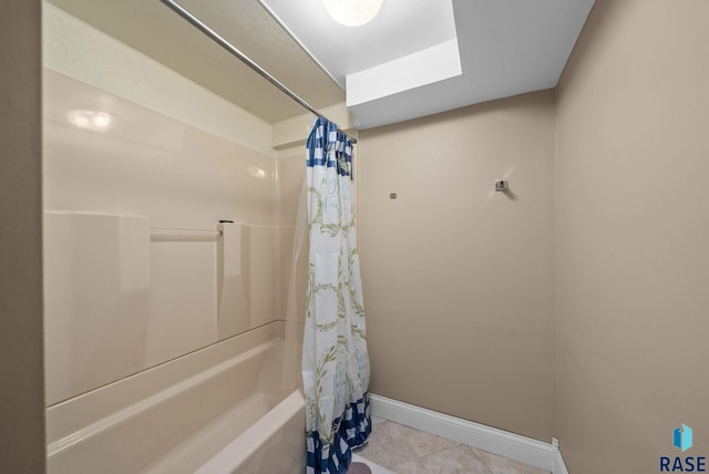 full bathroom with baseboards, tile patterned floors, and shower / bathtub combination with curtain