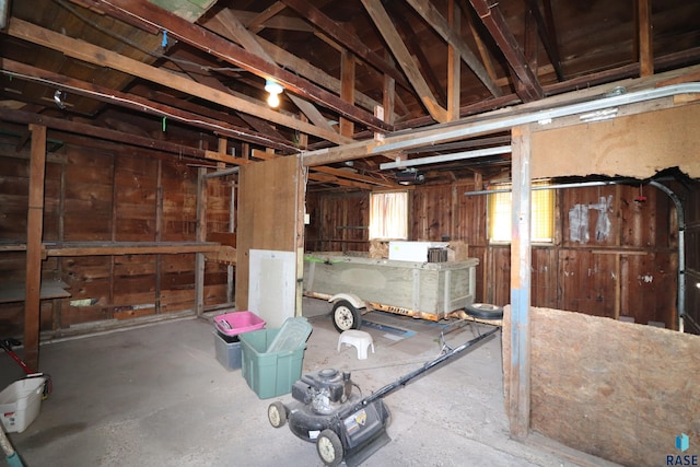 below grade area featuring wood walls