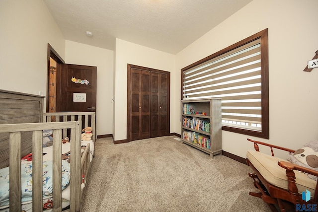 812 Trojan Ave, Hartford, SD 57033 - carpeted bedroom featuring baseboards and a closet