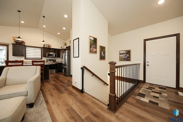 812 Trojan Ave, Hartford, SD 57033 - living area featuring wood finished floors, recessed lighting, and high vaulted ceiling