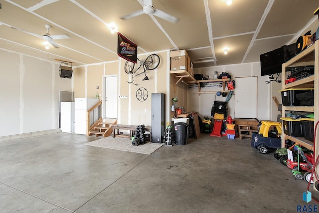 812 Trojan Ave, Hartford, SD 57033 - garage with a ceiling fan