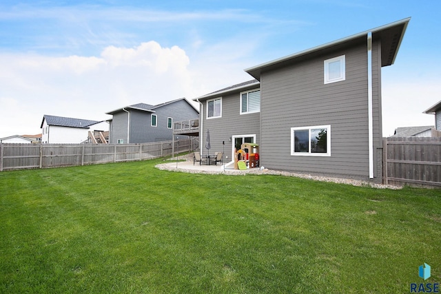 812 Trojan Ave, Hartford, SD 57033 - back of property with a patio