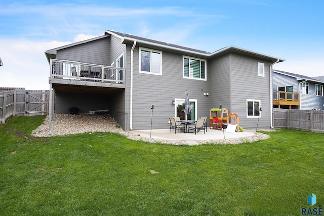 812 Trojan Ave, Hartford, SD 57033 - rear view of property with a patio area and a gate