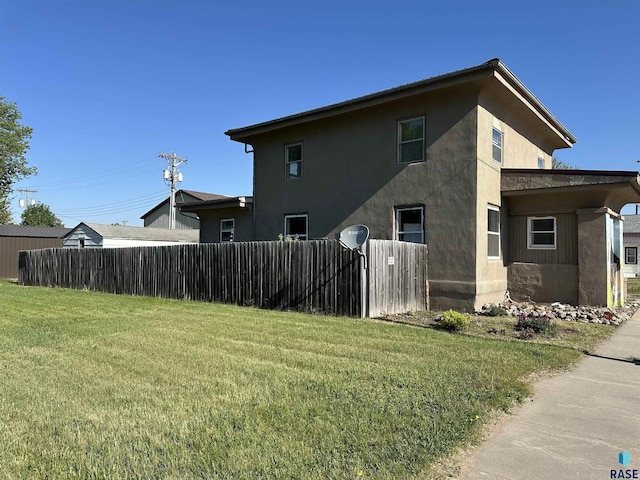 305 S 5th St, Menno, SD 57045 - view of side of home with stucco siding