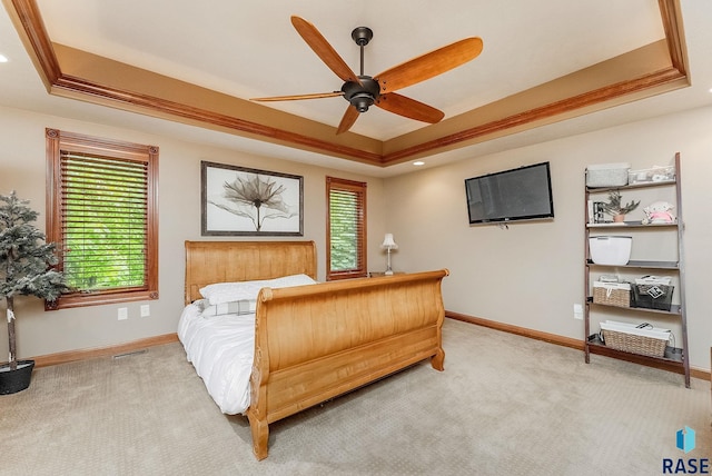 5616 S Shadow Wood Pl, Sioux Falls, SD 57108 - bedroom featuring a tray ceiling, baseboards, light carpet, and recessed lighting