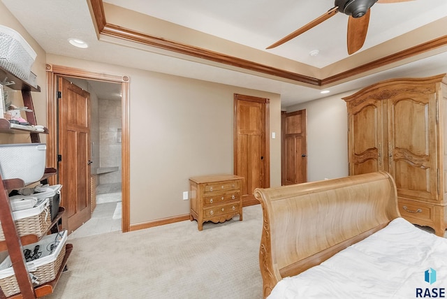 5616 S Shadow Wood Pl, Sioux Falls, SD 57108 - bedroom with a raised ceiling, recessed lighting, baseboards, light colored carpet, and ensuite bathroom