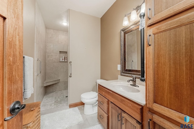 5616 S Shadow Wood Pl, Sioux Falls, SD 57108 - bathroom featuring a shower stall, vanity, toilet, and tile patterned flooring