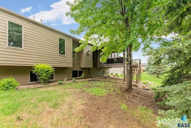 5616 S Shadow Wood Pl, Sioux Falls, SD 57108 - view of grassy yard with stairs and a wooden deck
