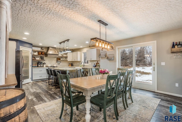 25265 466th Ave, Hartford, SD 57033 - dining room with a textured ceiling, dark wood-type flooring, recessed lighting, and baseboards