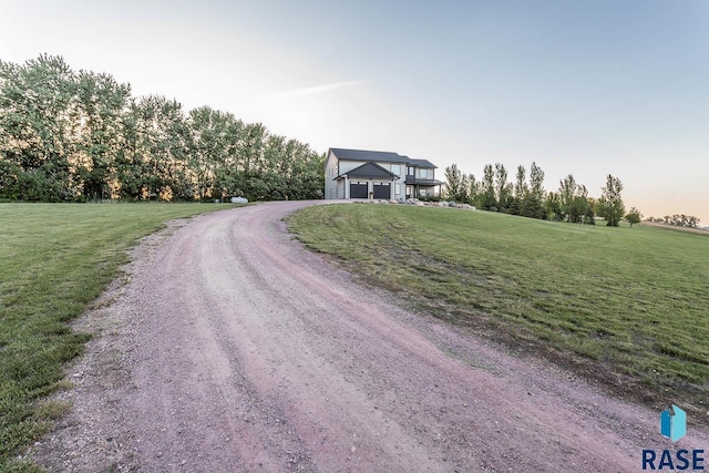 25265 466th Ave, Hartford, SD 57033 - view of front facade featuring a front lawn and dirt driveway
