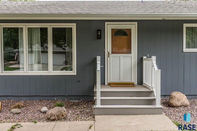 1002 N Carol St, Luverne, MN 56156 - property entrance featuring roof with shingles