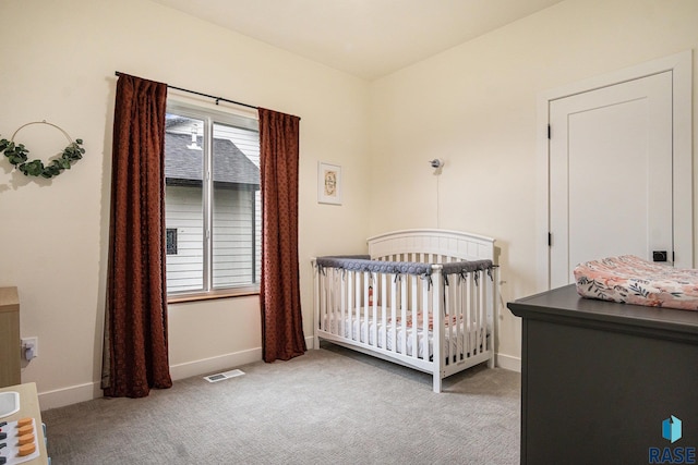 110 Skyline Dr, Valley Springs, SD 57068 - bedroom featuring carpet floors, a nursery area, and baseboards