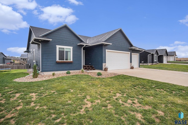 110 Skyline Dr, Valley Springs, SD 57068 - view of front of home featuring an attached garage, concrete driveway, and cooling unit