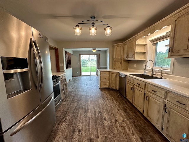 210 160th Ave, Edgerton, MN 56156 - kitchen featuring appliances with stainless steel finishes, a sink, light countertops, and dark wood-type flooring