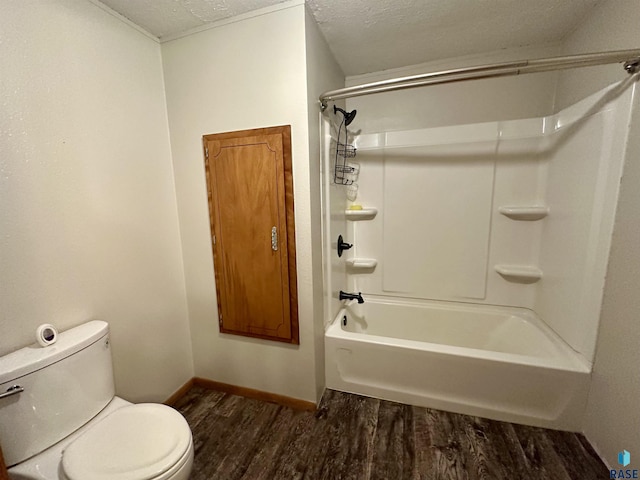 210 160th Ave, Edgerton, MN 56156 - full bath featuring wood finished floors, toilet, a textured ceiling, bathtub / shower combination, and baseboards