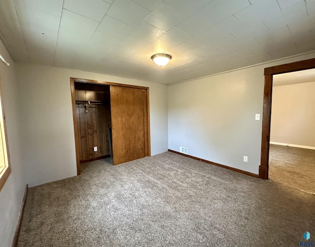 210 160th Ave, Edgerton, MN 56156 - unfurnished bedroom featuring carpet floors and a closet