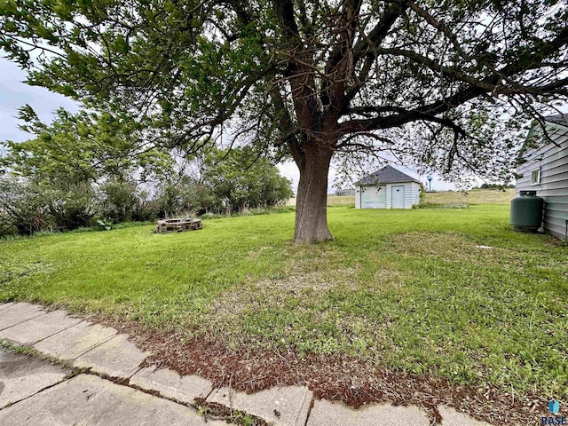 210 160th Ave, Edgerton, MN 56156 - view of grassy yard featuring an outdoor fire pit