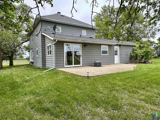 210 160th Ave, Edgerton, MN 56156 - back of property featuring a patio area and a lawn