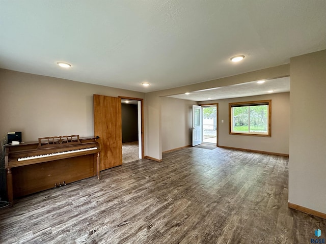 210 160th Ave, Edgerton, MN 56156 - unfurnished room featuring wood finished floors, baseboards, and recessed lighting