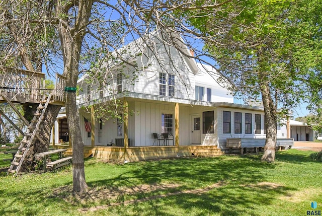 47138 293rd St, Beresford, SD 57004 - rear view of house featuring a lawn