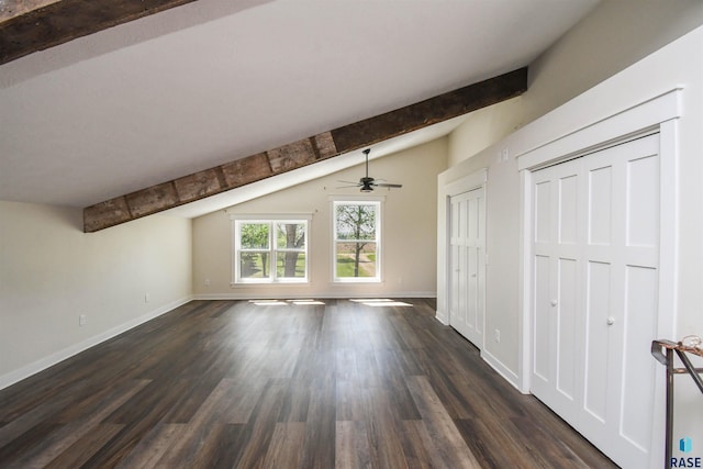 47138 293rd St, Beresford, SD 57004 - unfurnished living room featuring dark wood-style flooring, a ceiling fan, and baseboards