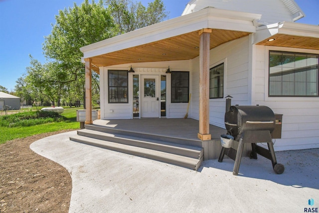 47138 293rd St, Beresford, SD 57004 - doorway to property featuring covered porch