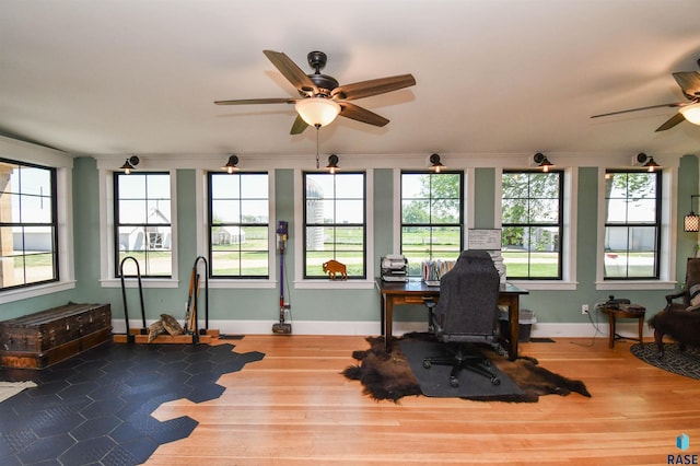 47138 293rd St, Beresford, SD 57004 - office with a ceiling fan, healthy amount of natural light, baseboards, wood finished floors, and ornamental molding