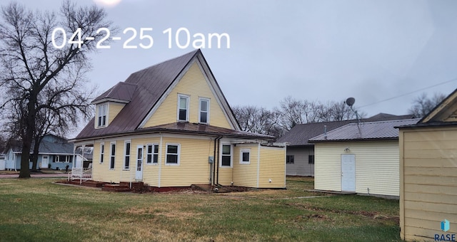 120 Main St, Scotland, SD 57059 - back of house with a lawn and metal roof