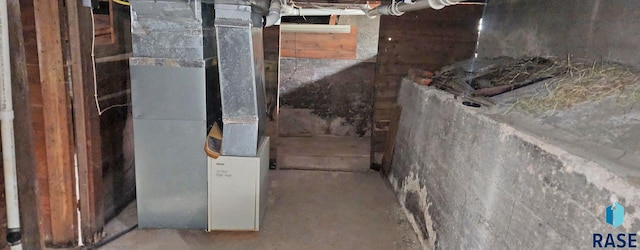 120 Main St, Scotland, SD 57059 - unfinished basement featuring heating unit
