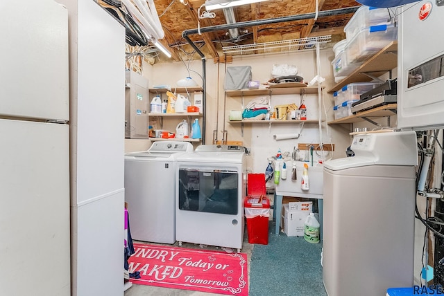 laundry room with washing machine and dryer