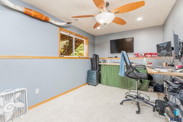 carpeted home office featuring ceiling fan, baseboards, and recessed lighting