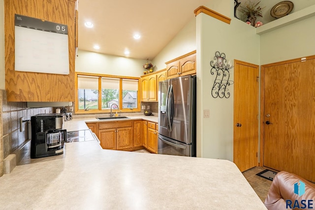 811 Southview Dr, Larchwood, IA 51241 - kitchen with stainless steel refrigerator with ice dispenser, a sink, light countertops, a peninsula, and recessed lighting