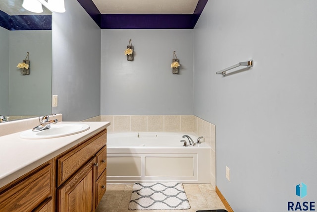 811 Southview Dr, Larchwood, IA 51241 - bathroom with a garden tub, vanity, and tile patterned flooring