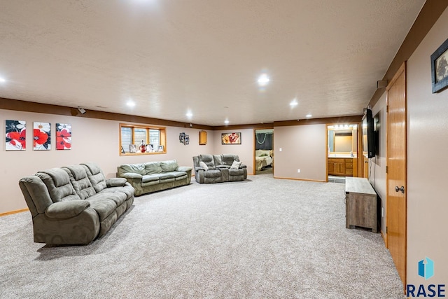 811 Southview Dr, Larchwood, IA 51241 - living area featuring light colored carpet, recessed lighting, baseboards, and a textured ceiling